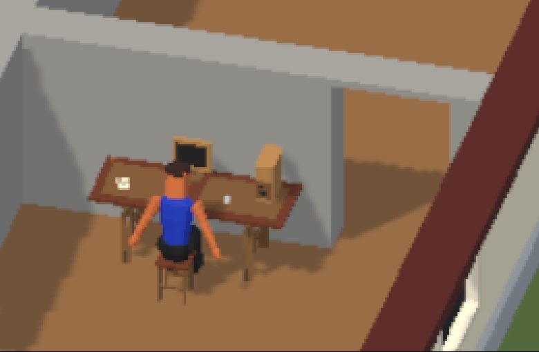 Die Spielfigur sitzt am Schreibtisch vor dem Rechner